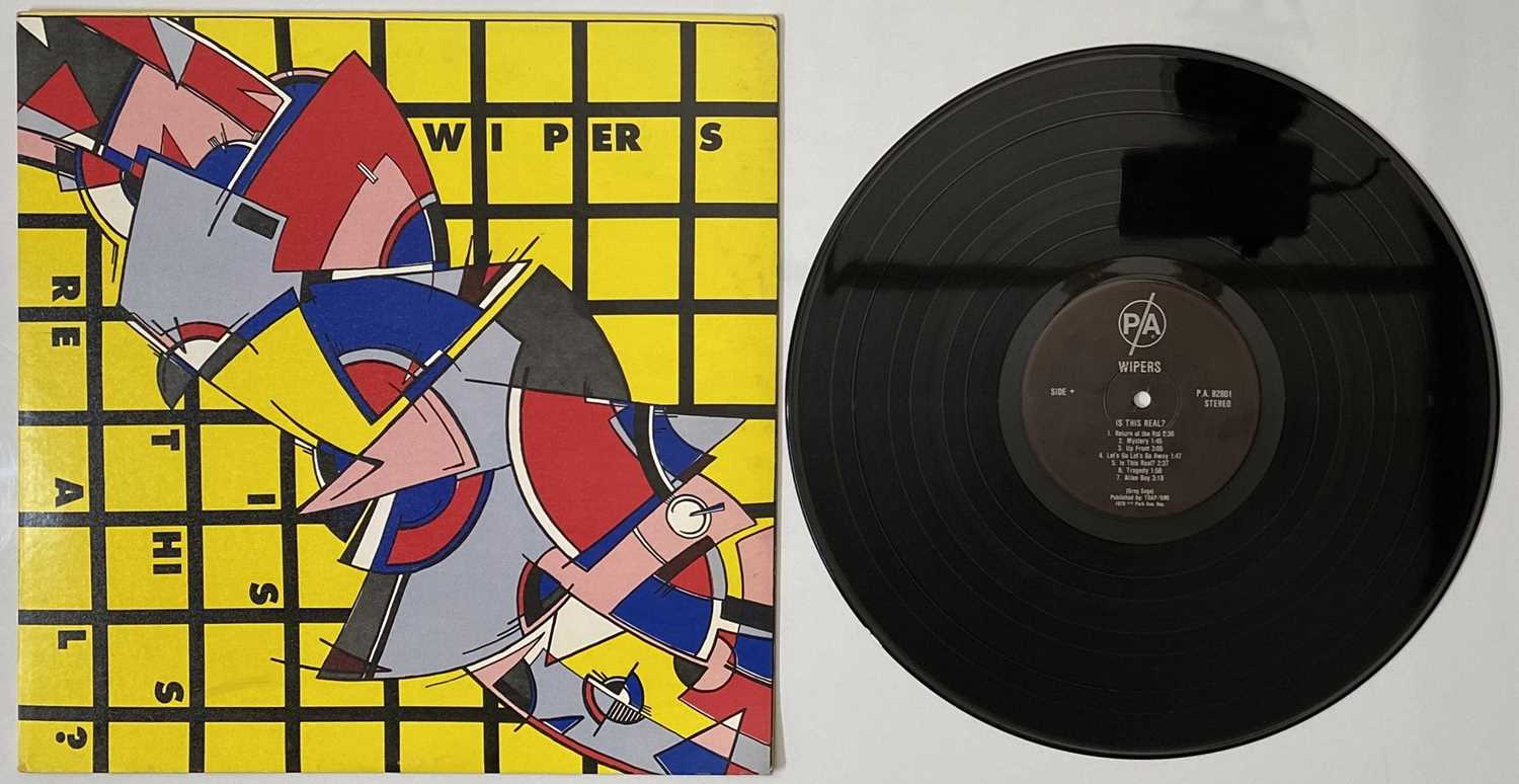 Lot 74 - WIPERS - IS THIS REAL? (P.A. 82801)
