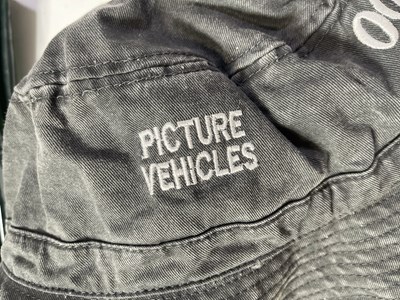 Lot 124 - JAMES BOND - CREW ISSUED CLOTHING AND MEMORABILIA.