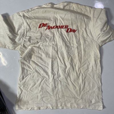 Lot 124 - JAMES BOND - CREW ISSUED CLOTHING AND MEMORABILIA.