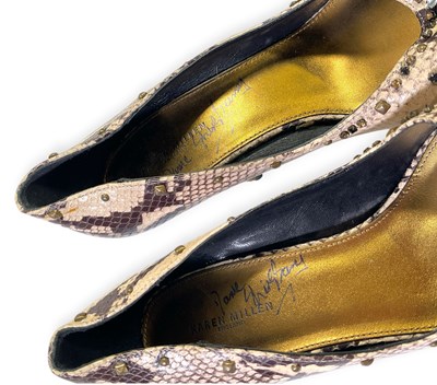 Lot 111 - DAME SHIRLEY BASSEY - TWO PAIRS OF SIGNED SHOES.