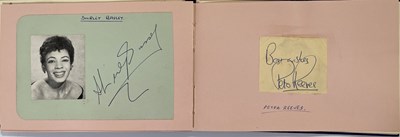 Lot 116 - 20TH C ENTERTAINMENT - AUTOGRAPH BOOK INC SHIRLEY BASSEY / HARRY SECOMBE.