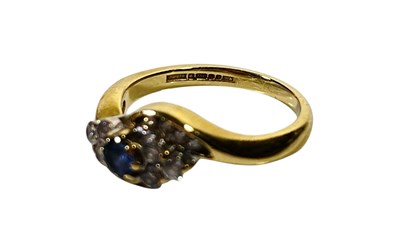 Lot 12 - 18CT GOLD AND DIAMOND RING.