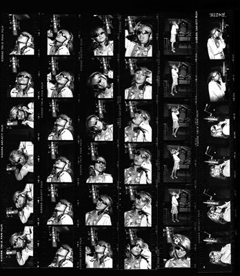 Lot 19 - MARTYN GODDARD - BLONDIE IN CAMERA - CONTACT SHEET OF DEBBIE RECORDING VOCALS FOR PARALLEL LINES.