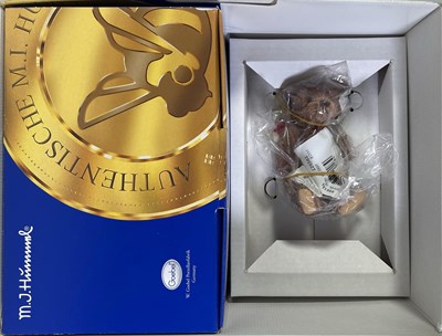 Lot 76 - STEIFF JCPENNEY 100 YEARS AND GOEBEL WITH STEIFF BEAR AND PORCELAIN FIGURE