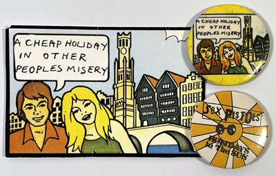 Lot 459 - SEX PISTOLS - ORIGINAL'HOLIDAYS IN THE SUN' POSTCARD AND BADGES.