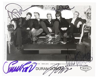 Lot 222 - DURAN DURAN - SIGNED 8X10" PHOTO.