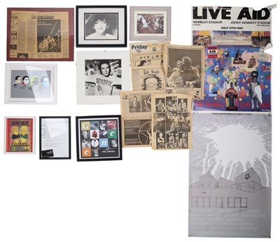 Lot 57 - MUSIC MEMORABILIA COLLECTION - BOOKS, MAGAZINES, LIVE AID POSTER AND MORE.