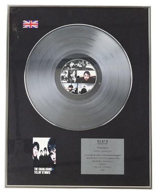 Lot 77 - THE CHARLATANS - ORIGINAL BPI PLATINUM DISC FOR 'TELLIN' STORIES'.