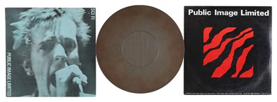 Lot 569 - PUBLIC IMAGE LIMITED - PRIVATE LP AND METAL TIN PACK