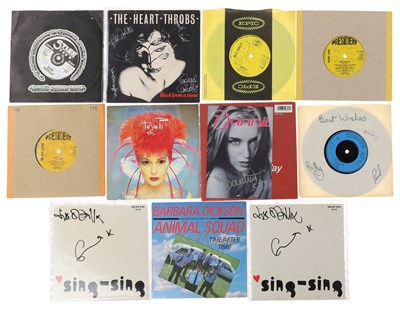 Lot 218 - SIGNED SINGLES INC ELVIS COSTELLO.