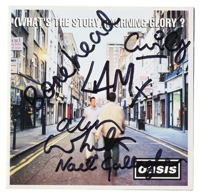 Lot 392 - OASIS - SIGNED CD BOOKLET.
