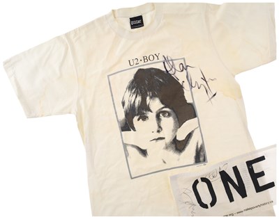 Lot 224 - U2 - SIGNED T-SHIRT AND BANNER.