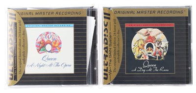 Lot 77 - QUEEN GOLD DISC CD PACK