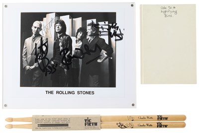 Lot 311 - THE ROLLING STONES - FULLY SIGNED PHOTO / CHARLIE SIGNED DRUMSTICKS AND MORE.