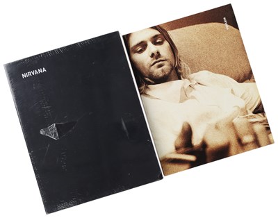 Lot 103 - NIRVANA - COLLECTABLE PHOTO BOOKS - ONE SEALED.