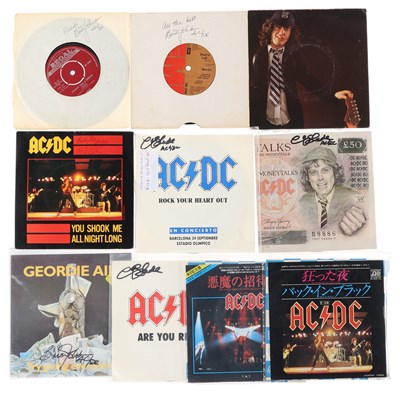 Lot 347 - AC/DC - BAND MEMBER SIGNED SINGLES INC COLLECTABLE JAPANESE ISSUES.