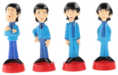 Lot 145 - THE BEATLES - C 1980S CARTOON FIGURINES.