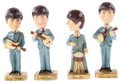 Lot 150 - BEATLES CAR MASCOTS NODDING HEAD DOLLS.