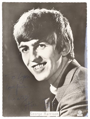 Lot 301 - THE BEATLES - GEORGE HARRISON SIGNED 8X6" PHOTO.