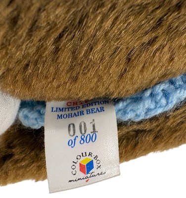 Lot 23 - THREE COLOUR BOX BEARS