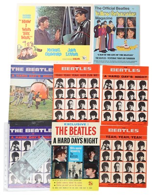 Lot 164 - THE BEATLES - FILM-RELATED MEMORABILIA INC OVERSEAS FILM BOOKS.