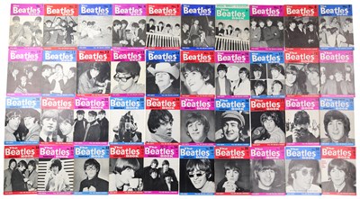 Lot 238 - THE BEATLES - COMPLETE SET OF MONTHLY BOOKS.
