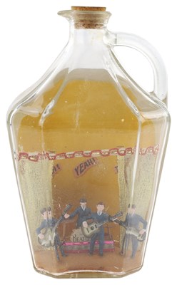 Lot 200 - THE BEATLES - SUBBUTEO FIGURINES IN A GLASS BOTTLE.